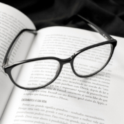 trademark text book with eyeglasses on top